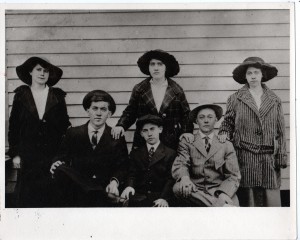 My grandfather's siblings: Based on their ages, I'm guessing that back row, left to right are Wirt (Gregory) Roberts, Virgie (Morgan) Roberts, and Nancie (Quillen) Roberts. The boys in front are Edd, Bascum and Elbert ("Sug") Roberts